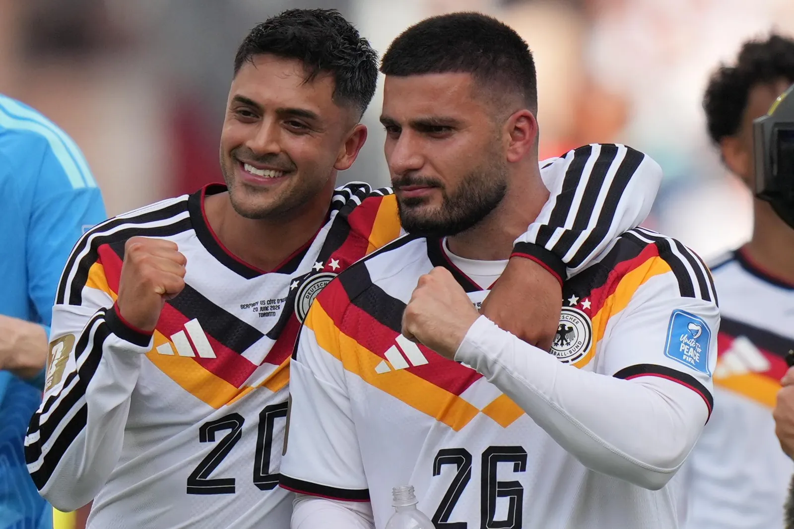 Germany's Nadiem Amiri, left and teammate Germany's Deniz Undav World Cup Group E soccer match between Germany and Ivory Coast in Toronto, Saturday, June 20, 2026. (AP Photo/Stephanie Scarbrough)