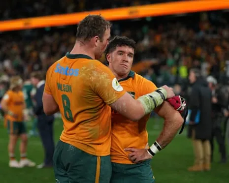 Wallabies captain Harry Wilson consoles Ben Donaldson after he misses a kick
