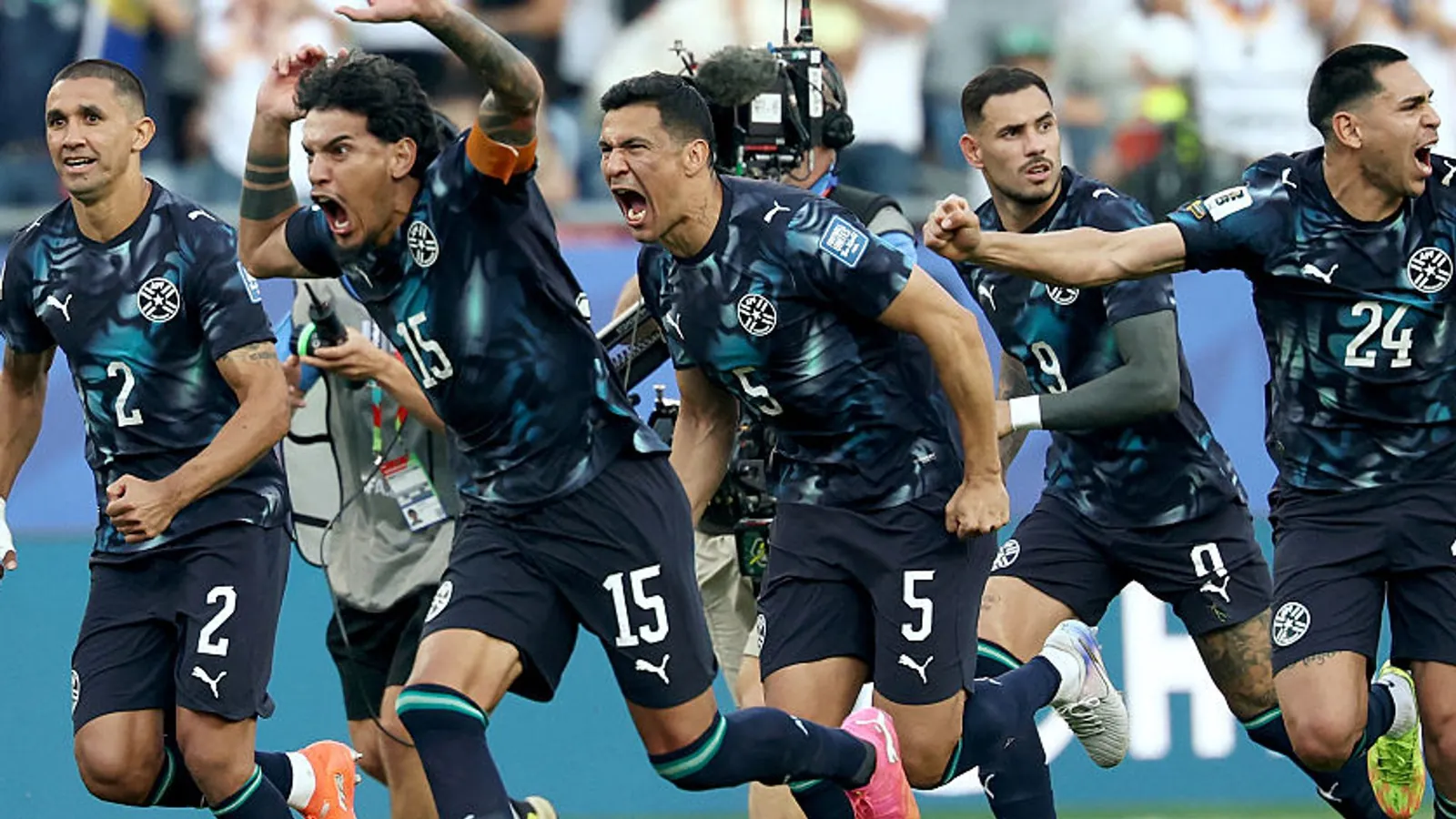 Paraguay's players celebrate after winning the penalty shootout during the 2026 World Cup round of 32 football match between Germany and Paraguay at the Boston Stadium in Foxborough on June 29, 2026. (Photo by FRANCK FIFE / AFP)