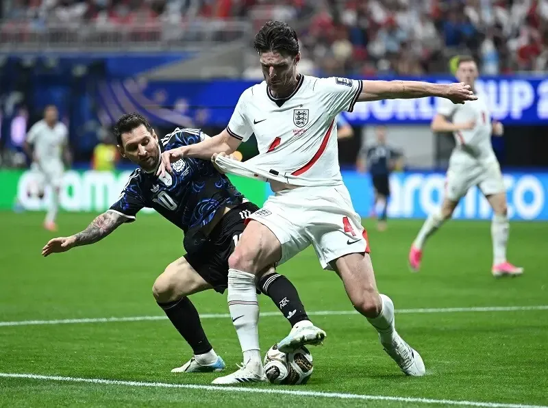Declan Rice of England is challenged by Lionel Messi of Argentina during the FIFA World Cup 2026 Semi Final match between England and Argentina at Atlanta Stadium on July 15, 2026. — AFP