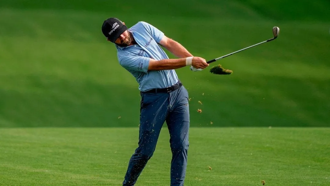 Cameron Young hits from the 14th fairway during third round of the Truist Championship golf tournament at the Quail Hollow Club, Saturday, May 9, 2026, in Charlotte, N.C.